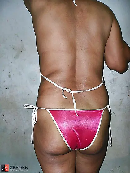 Indian mummy in net brassiere and wire thong