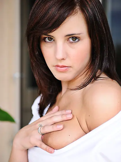 Cute babe Brooke Adams gets off her clothes and lingerie and sho