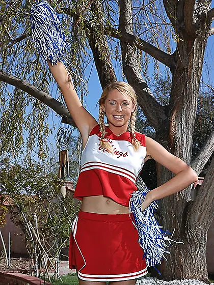 Brynn Tyler takes her slutty cheerleader outfit on the field and