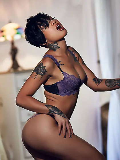 Hot solo pictures of the tattooed Asian with short hair and sens