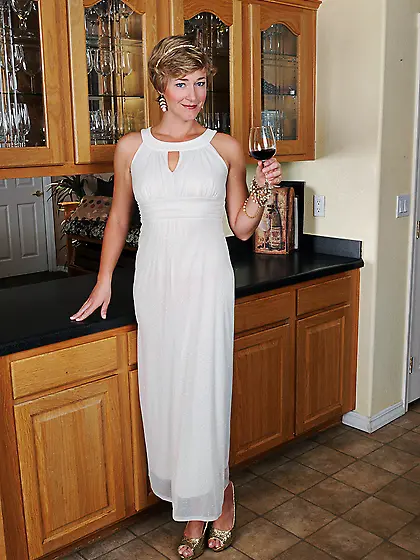 Elegant redhead milf