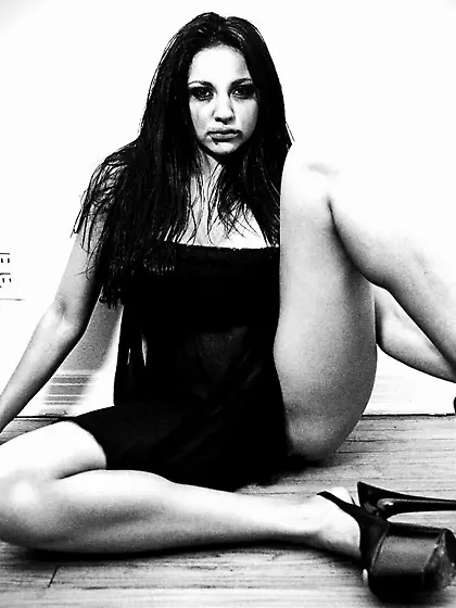 Raven haired babe Audrey Bitoni spreads her legs in this black w