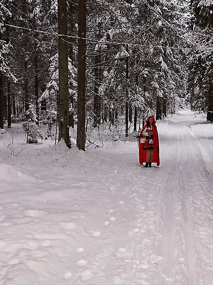 Little Red Hood in deep forest