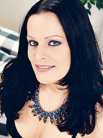 Lecherous brunette Sabina P bares black lingerie and pumps her p