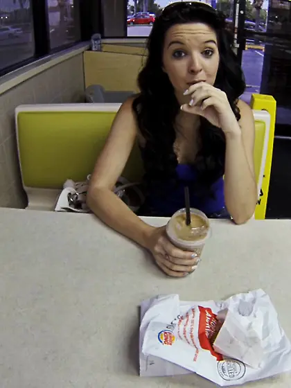 Curly-haired brunette red panties