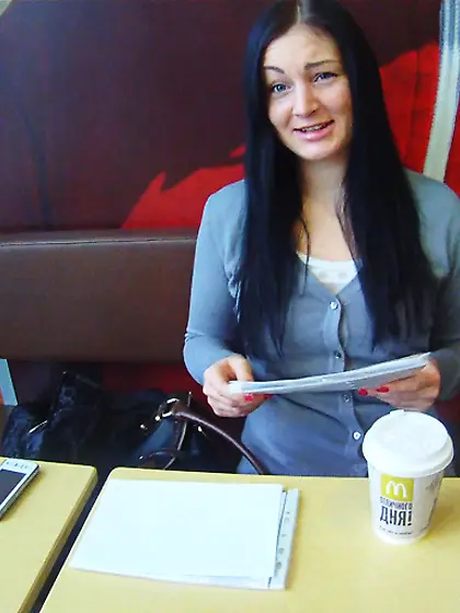 Black-haired young lady picked