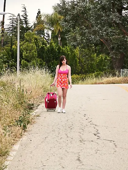 Carolyn Reese and Jennifer White strip together on the sofa and