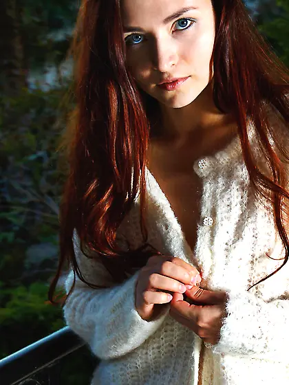 White stockings redhead posing like a pro while on the balcony V