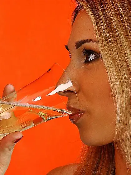 Ginger Devil spreads her sexy legs for the camera and gets her f