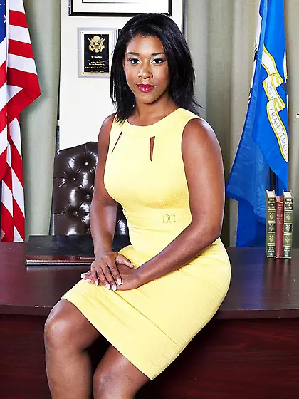 Fantastic curvy black babe Megan Vaughn poses in the oval office