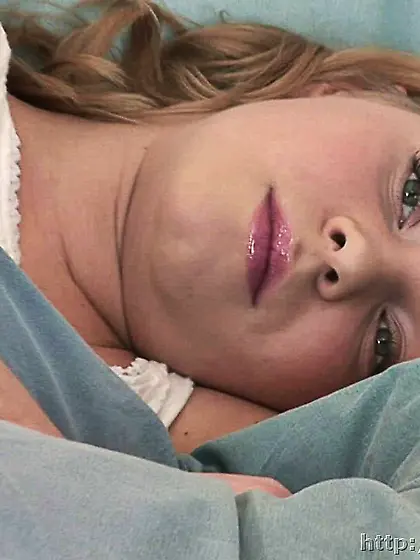 Russian teen blonde masturbates her shaved pussy in the