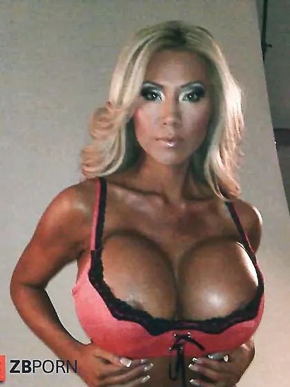 Huge Fake Titted Asian Fitness Model