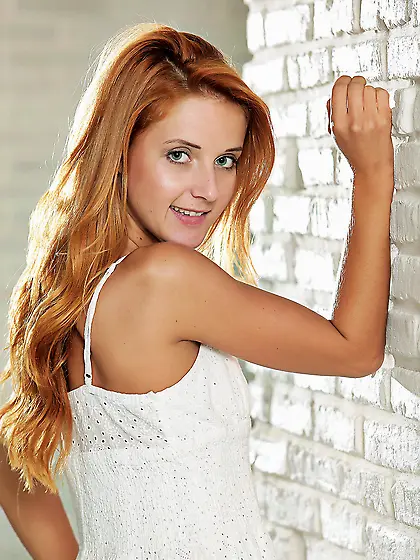 Slim tanned ginger babe in white dress Roberta Berti strips for