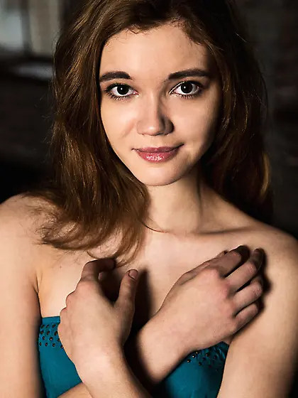 Teen slips off the sexy blue body to show bald pussy and small b