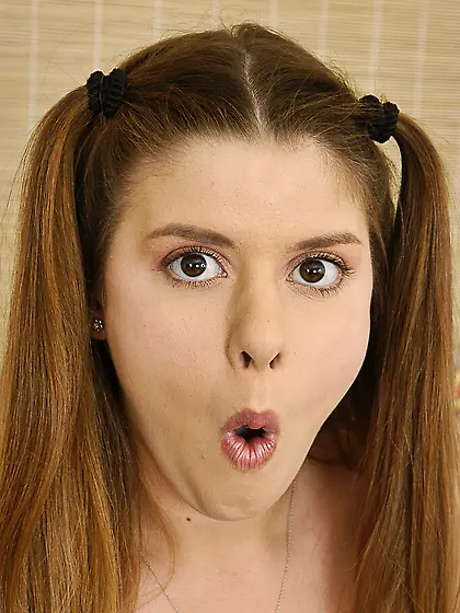 Pigtailed girl Aspen Stevens with big juicy melons gets naked an