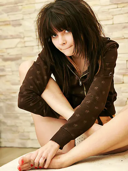 Hot emo babe Kaira 18 takes off her brown hoodie and shows us he