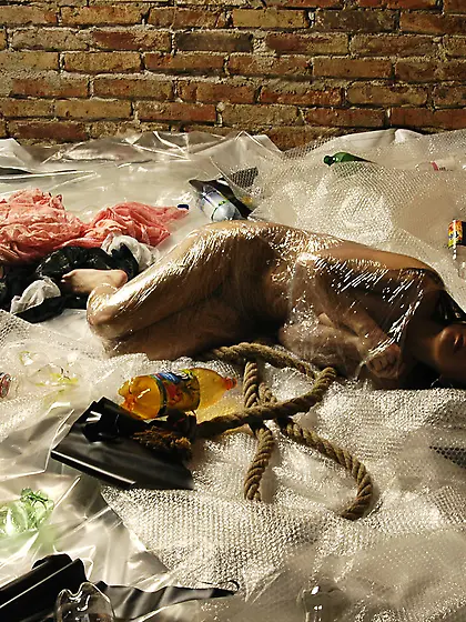 Naked girl hotly frees tempting body from restrictive tape cover