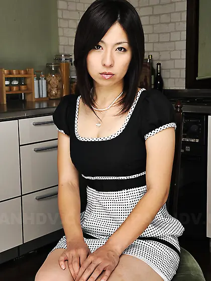 Randy brunette Asian bares breasts but man comes feeling them up