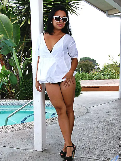 Petite young brunette exposing her sexy body by the pool,  this A