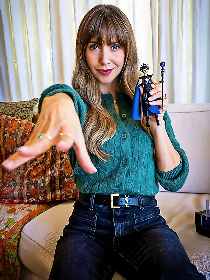 Alison Brie with Evil-Lyn toy