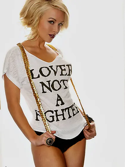 Sexy blondie,  Kayden Kross,  takes off her panties to masturbate