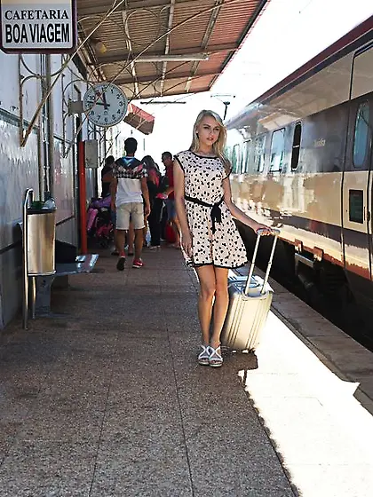 Charming blonde sweetie in dress flashes panties on the railway