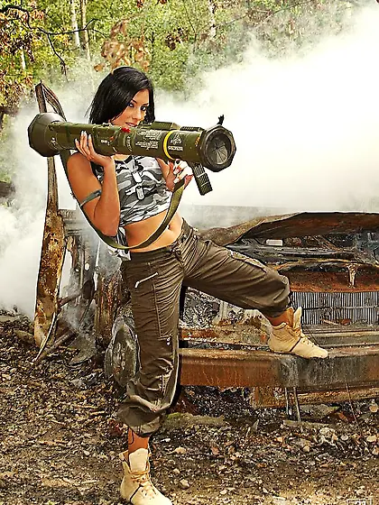 Anetta Keys takes her sexy army outfit outdoors and shows us her