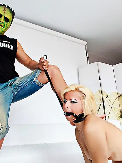 Submissive blonde gag-ball nipple