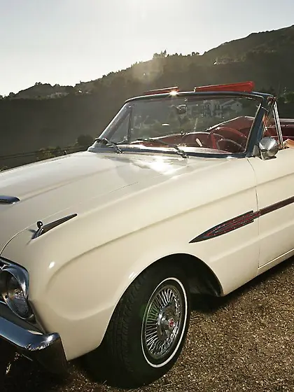 Taking the cowboy hat off of her blonde hair Layla Taylor gives