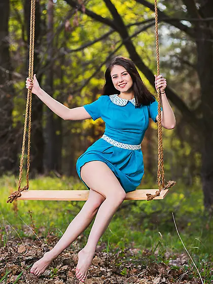 Dark-haired beauty takes off her blue dress and shows off her as