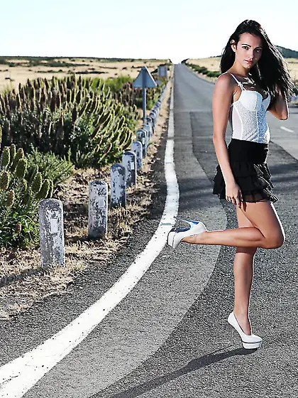 Beautiful and naked girl standing by the road? It???s every driv