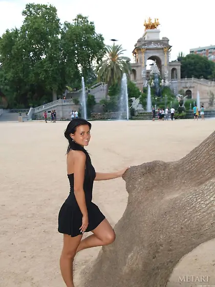 Bronzed beauty with a hot nude body shows her curves in public V