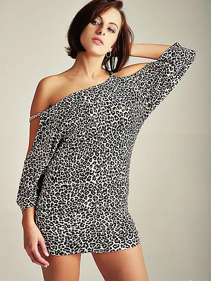 Adorable brown haired model reveals her sexy body and enjoys som