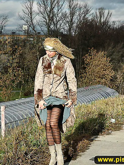 Teen blonde pissing outdoor near the highway