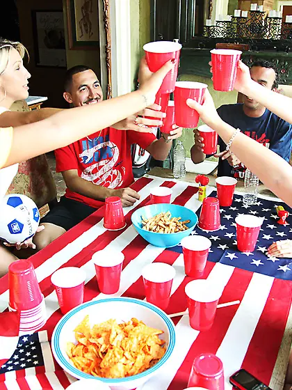 USA-loving soccer-enjoying babes get fucked side by side on a co