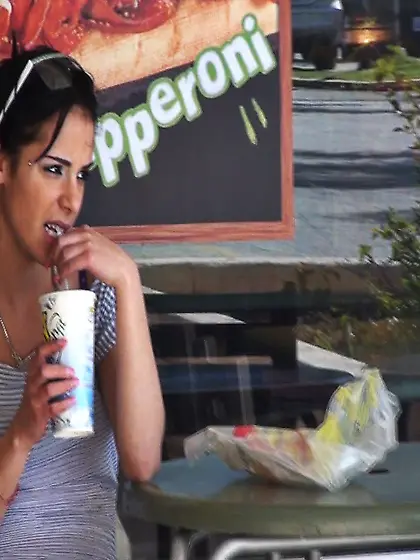 Spycam shoots a beautiful brunette babe drinking her morning cof