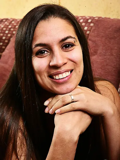 Mischievous Latina with eyebrow piercing doesn't mind showing of