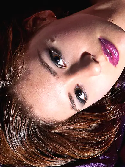 Aroused dark haired girl Irina J enjoys in posing nude and getti