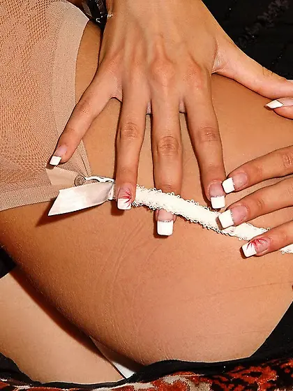 Seductive brunette Anita Pearl with sexy butt wearing white lace