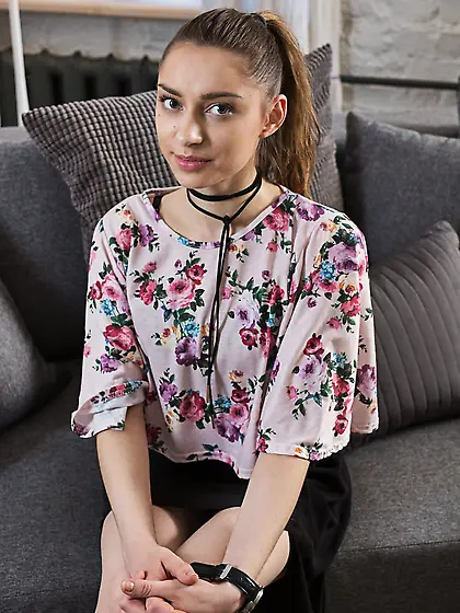 Teen lassie lights a candle and removes elegant outfit to demons