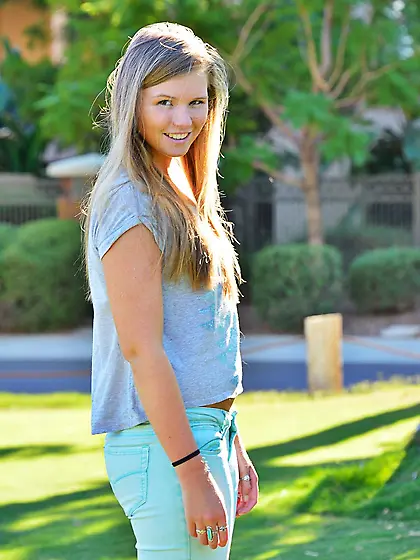 Kinky teenager Melissa May is smiling and starts rubbing fingers