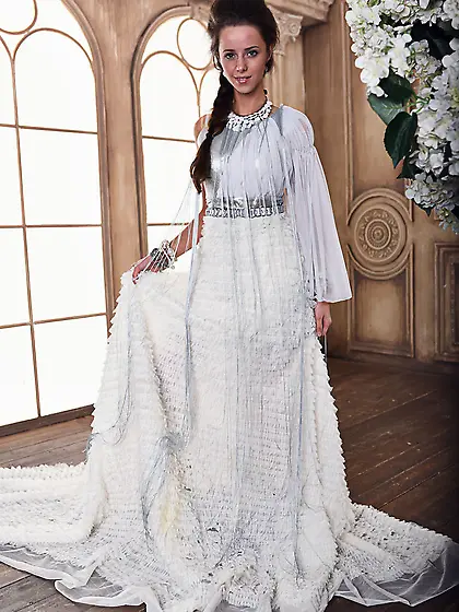 Babe takes her fine dress off taking poses on a big chair and br