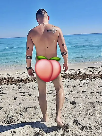 Man naked at nude beach