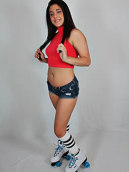 Awesome brunette shows her rollerblading skills and such