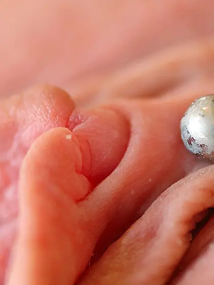 Blue-eyed blonde gives you hot close-ups of her pierced pussy