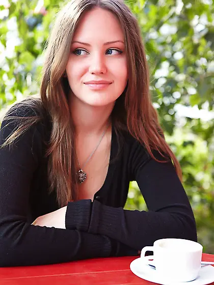 Dark-haired gal exposing her ass,  legs,  and pussy in a hot galle