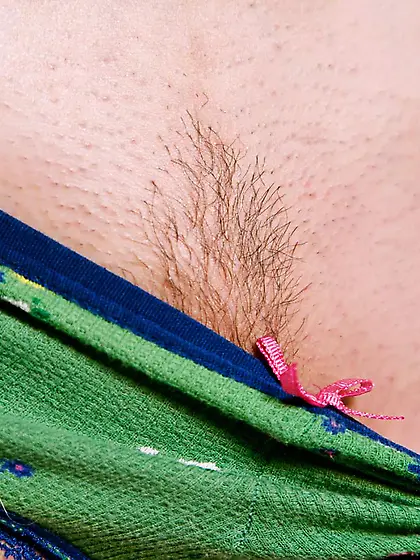 Blonde girl Ashley Jane takes off her green top and panties to s