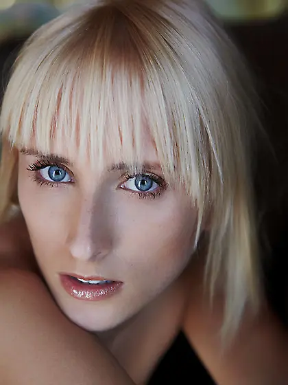 Blonde lady exudes an aura of honor and true lust as well