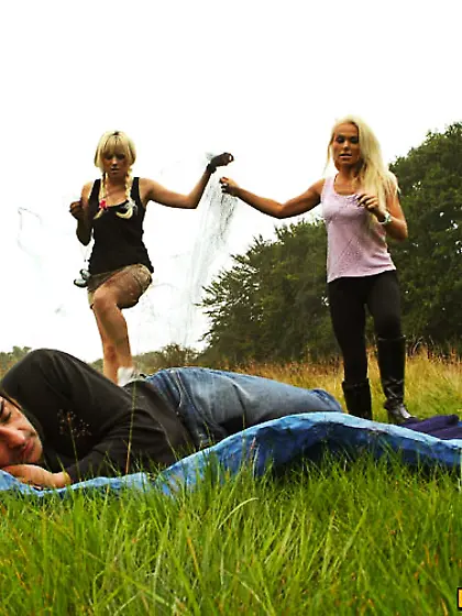 Two horny blondes rapes a man in the fields
