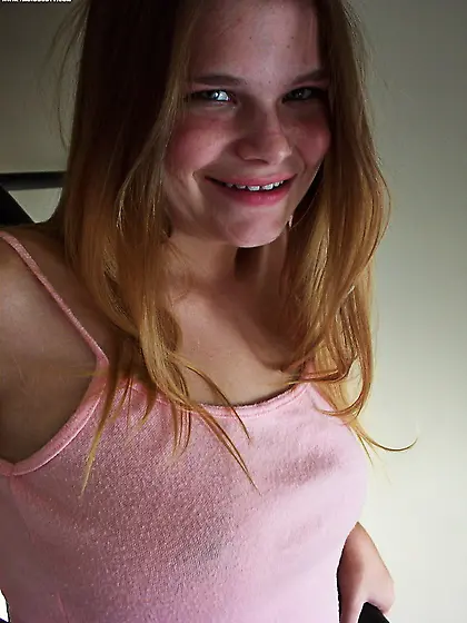 Young teen strips model